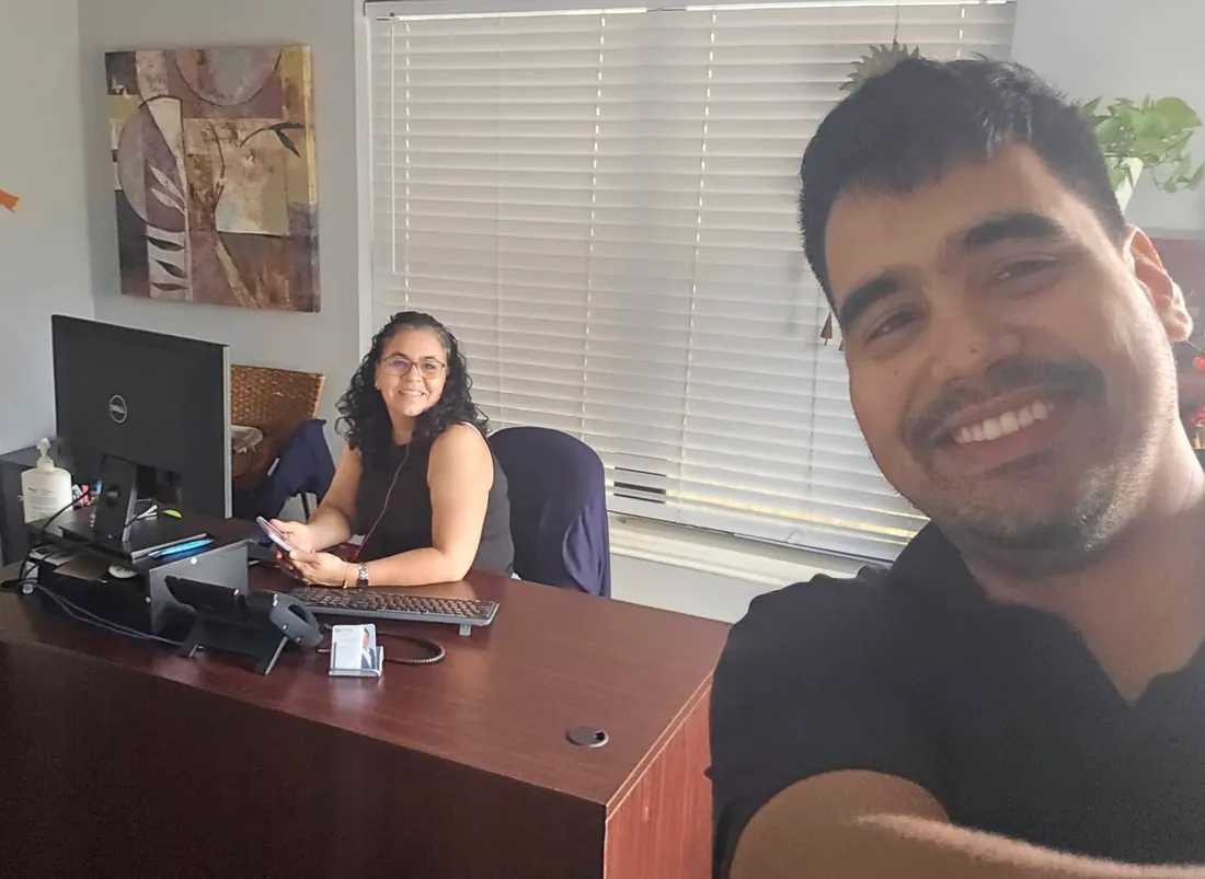 Diana and Mario at work in the Integrity Insurance office